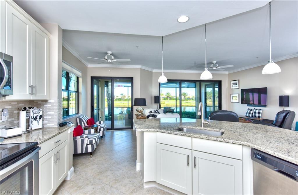 10470 Casella Way, Unit 101 Fort Myers, FL 33913 - Photo 4 of 34 a kitchen with counter top space and a sink
