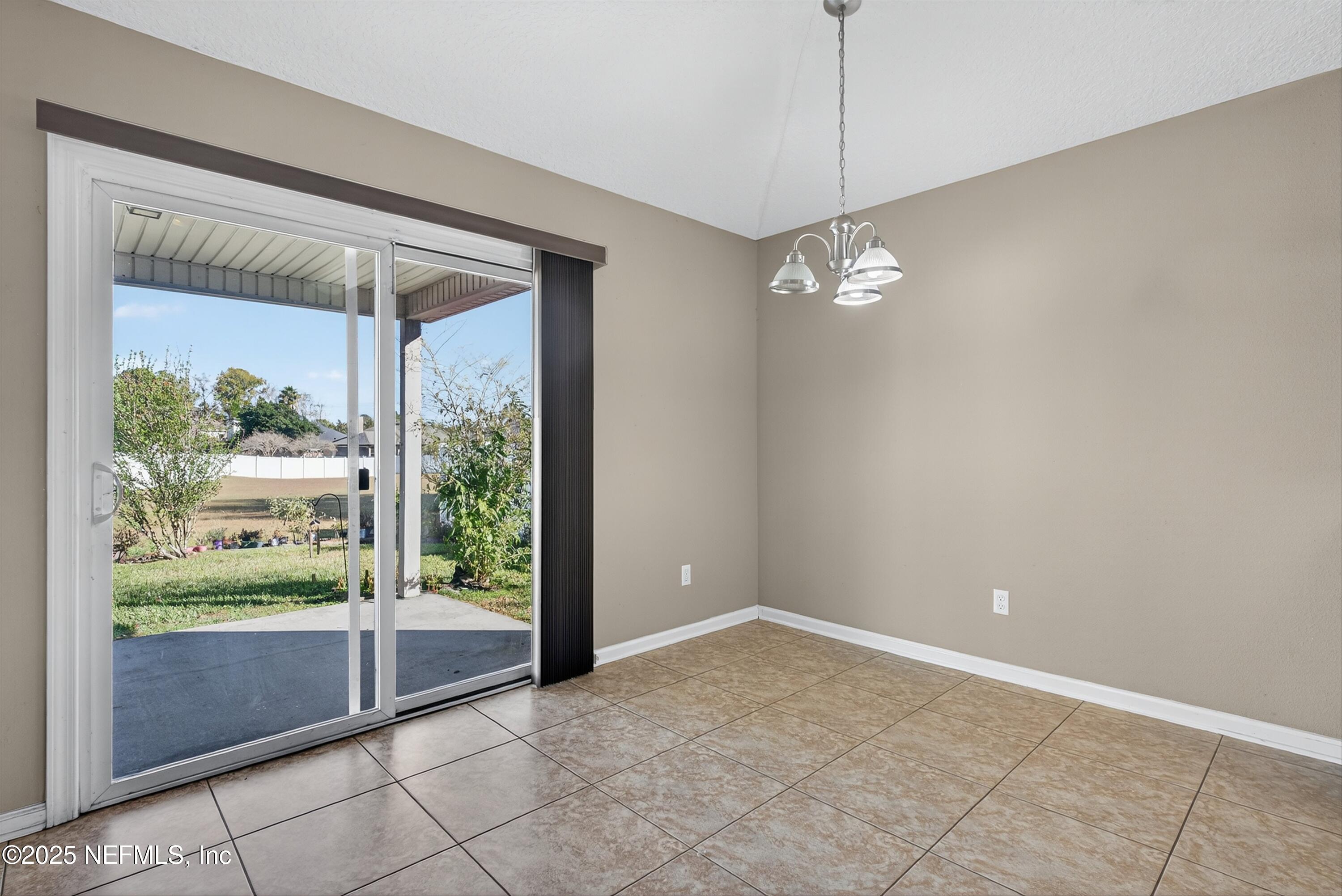 4045 Trail Ridge Road Middleburg, FL 32068 - Photo 20 of 45 a view of a room with window carpet and windows