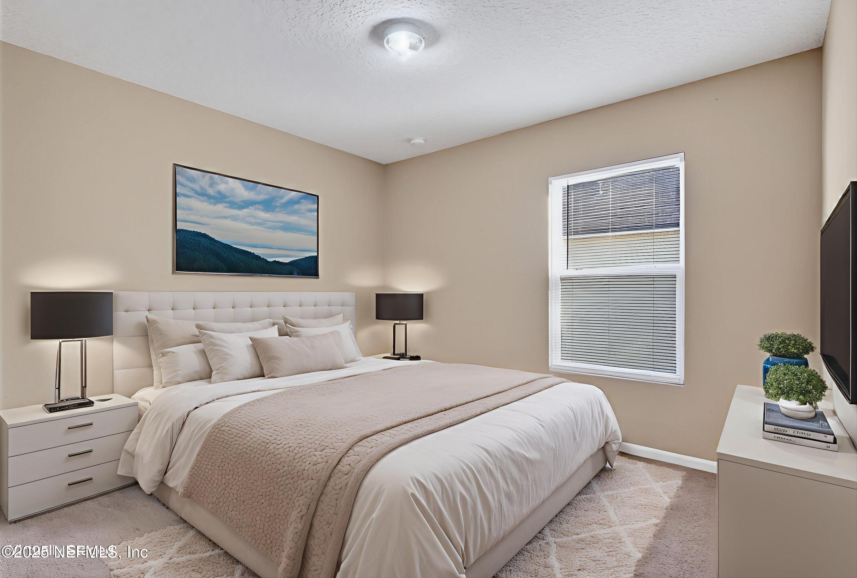 4045 Trail Ridge Road Middleburg, FL 32068 - Photo 33 of 45 a bedroom with double bed and a window