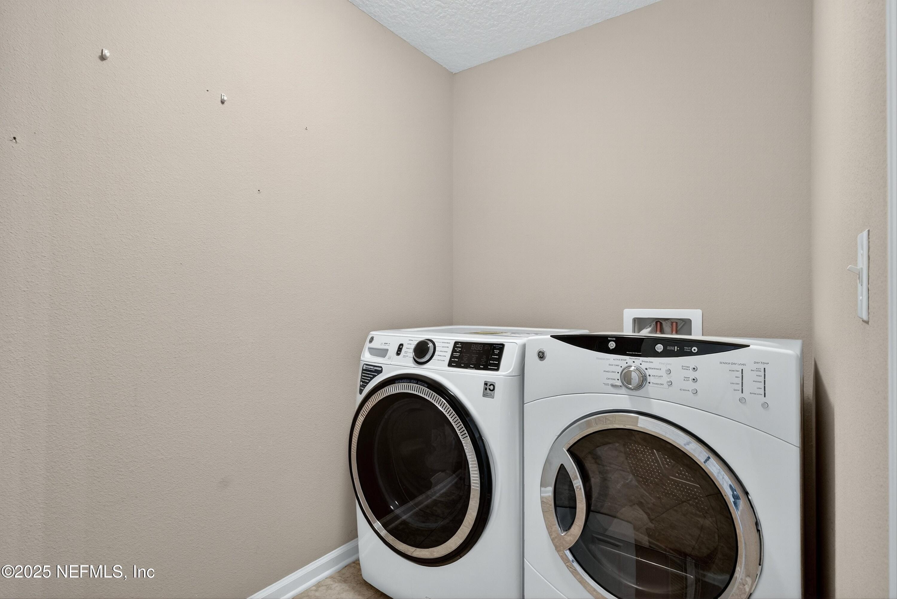 4045 Trail Ridge Road Middleburg, FL 32068 - Photo 40 of 45 a utility room with dryer and washer