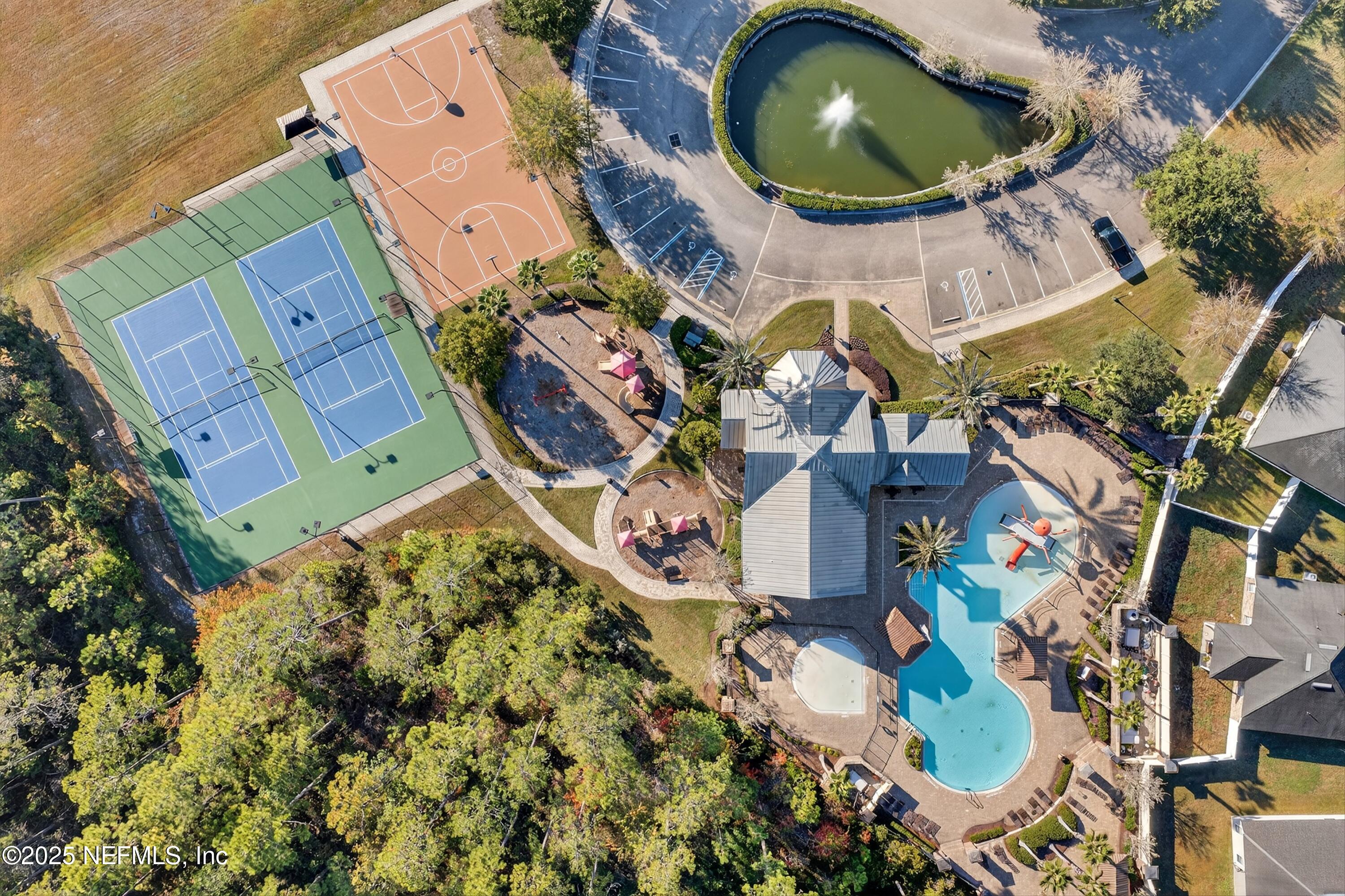 4045 Trail Ridge Road Middleburg, FL 32068 - Photo 42 of 45 an aerial view of a house with a swimming pool and outdoor seating