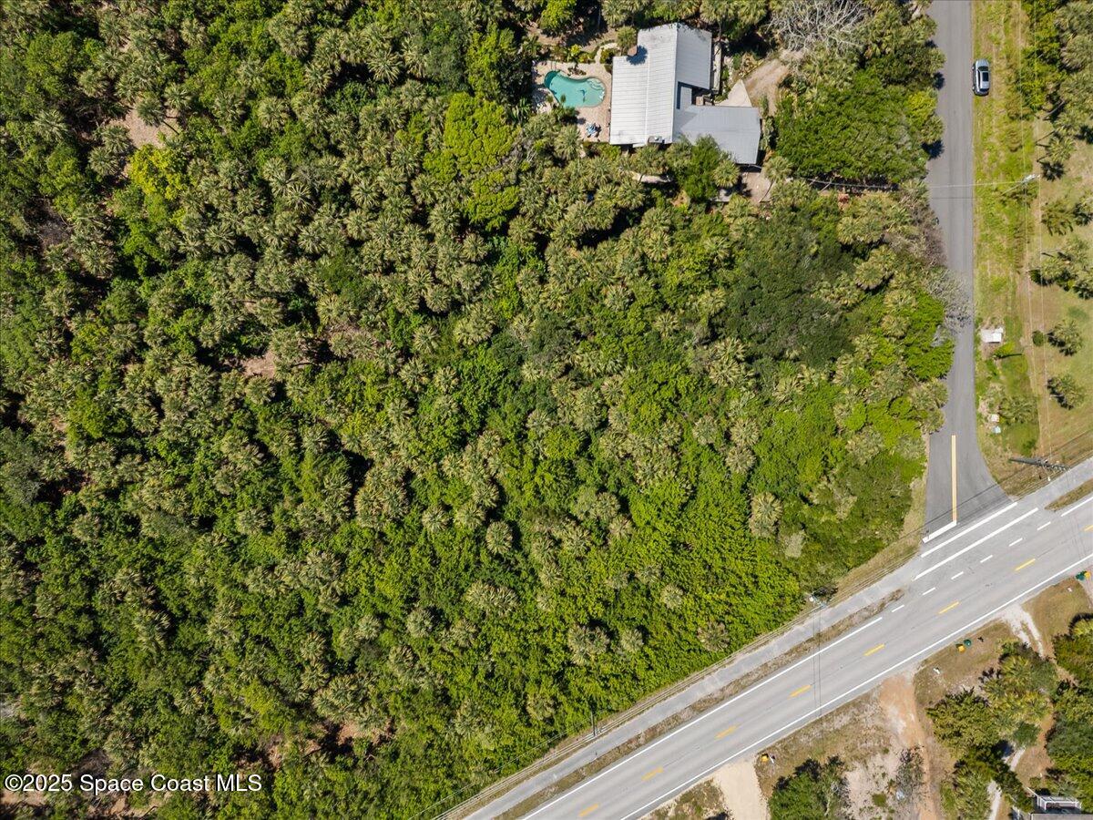 101 Seagrape Road Melbourne Beach, FL 32951 - Photo 4 of 19 12-DJI_008410