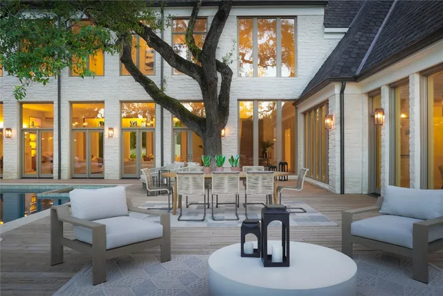 a view of roof deck with patio