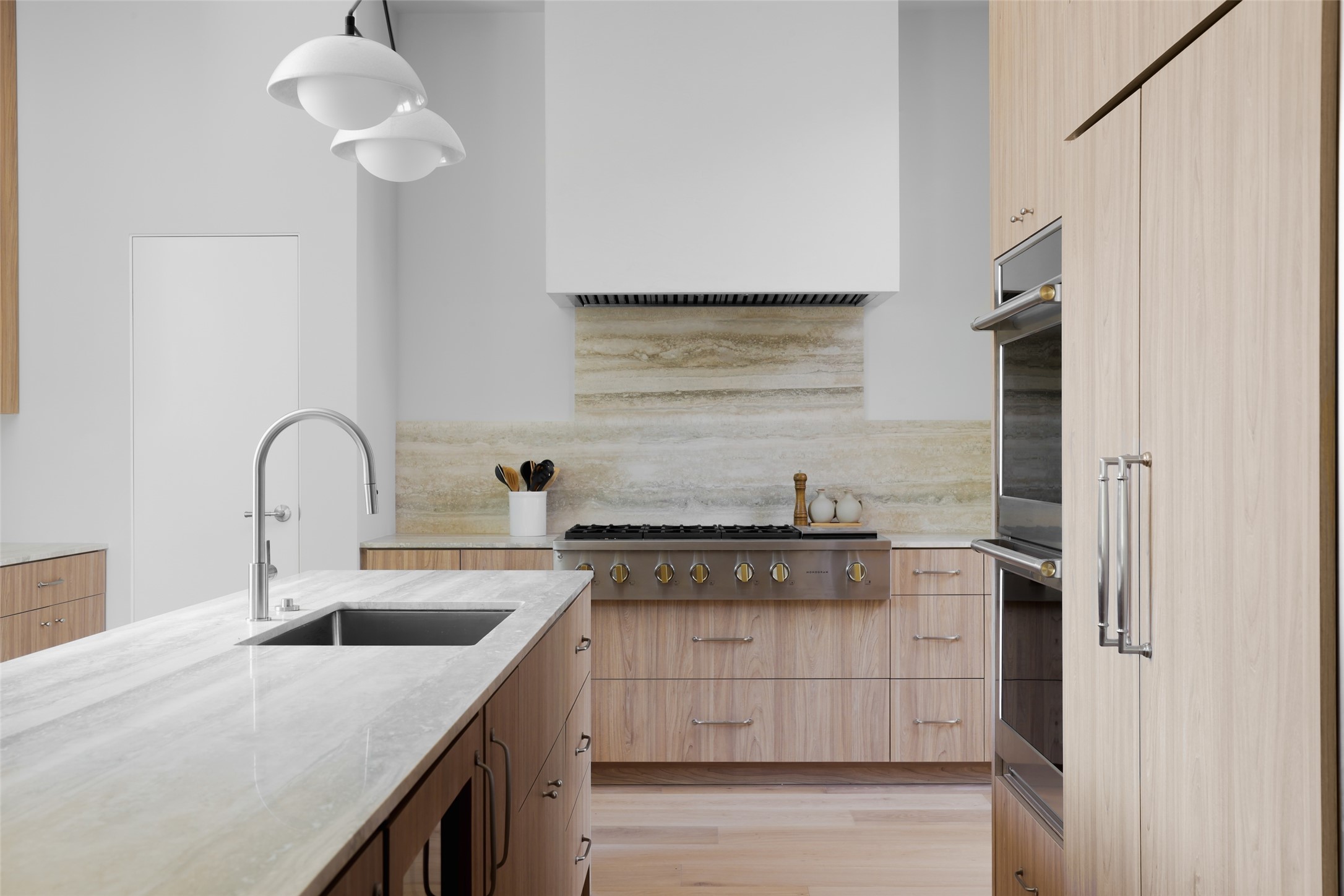 3614 Murillo Circle Austin, TX 78703 - Photo 24 of 40 a kitchen with stainless steel appliances granite countertop a sink stove and refrigerator