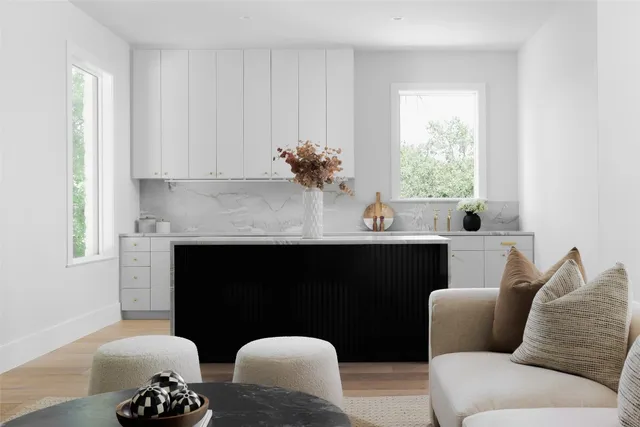 a view of a vase of flowers sitting on a shelf