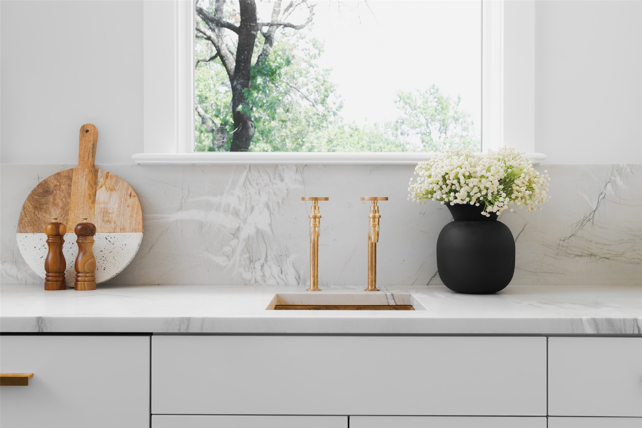 3614 Murillo Circle Austin, TX 78703 - Photo 27 of 40 a view of a vase of flowers sitting on a shelf
