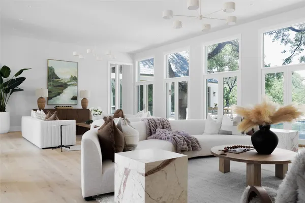 a living room with furniture and decor