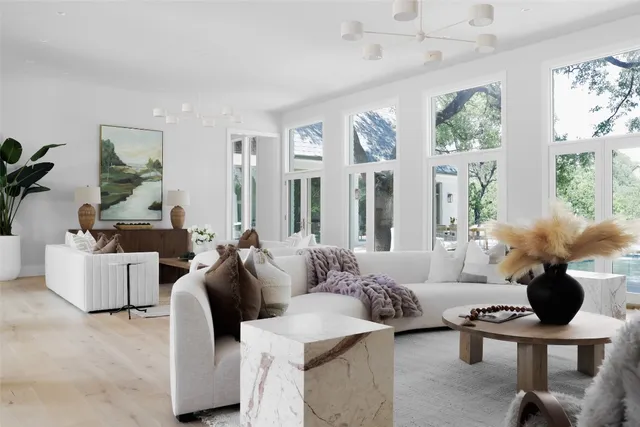 a living room with furniture and decor