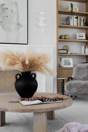 a living room with furniture and decor