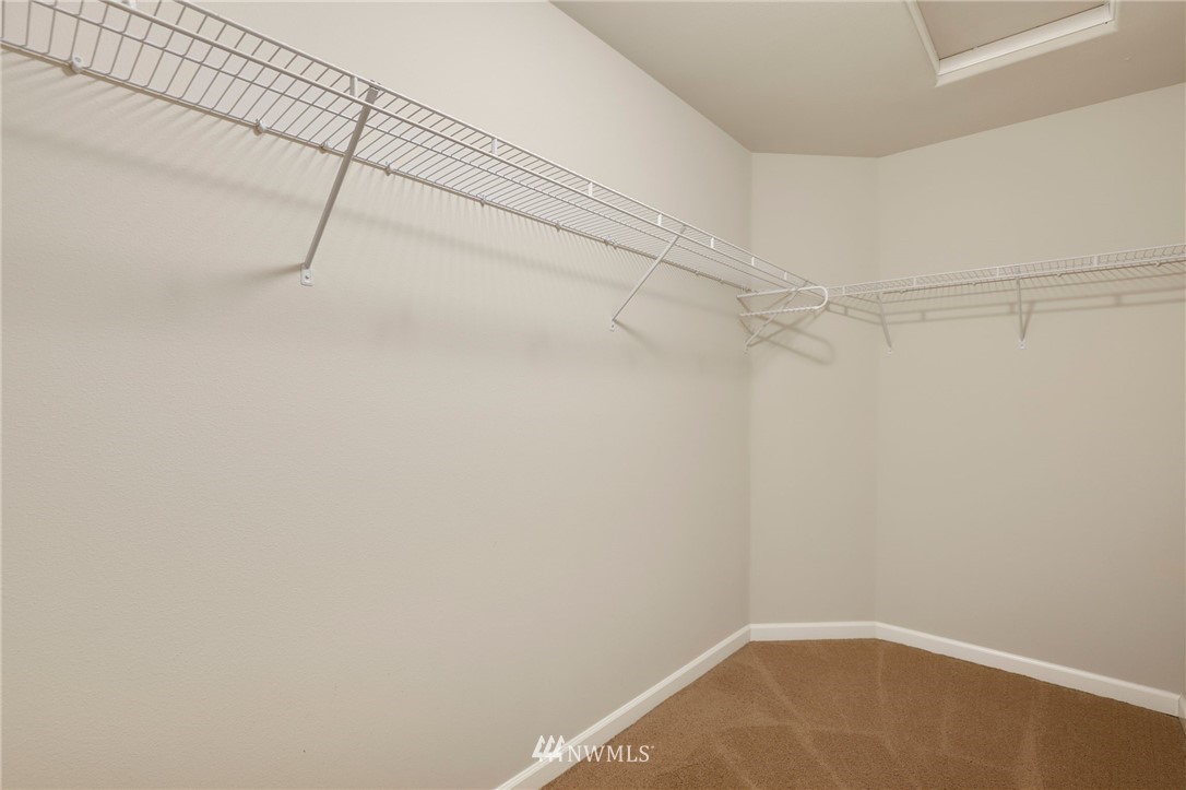 7301 Radius Loop Southeast Lacey, WA 98513 - Photo 21 of 39 a view of a room with racks on the wall