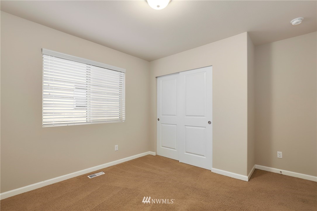 7301 Radius Loop Southeast Lacey, WA 98513 - Photo 27 of 39 a view of an empty room with a window