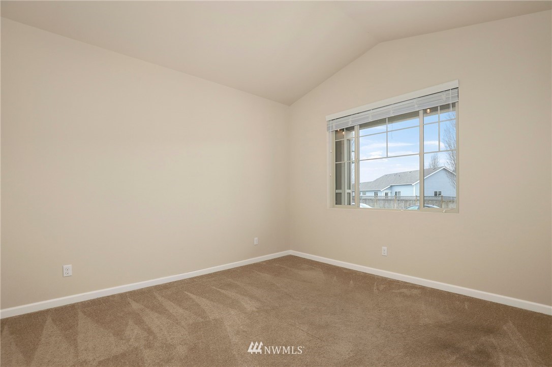 7301 Radius Loop Southeast Lacey, WA 98513 - Photo 28 of 39 an empty room with a window