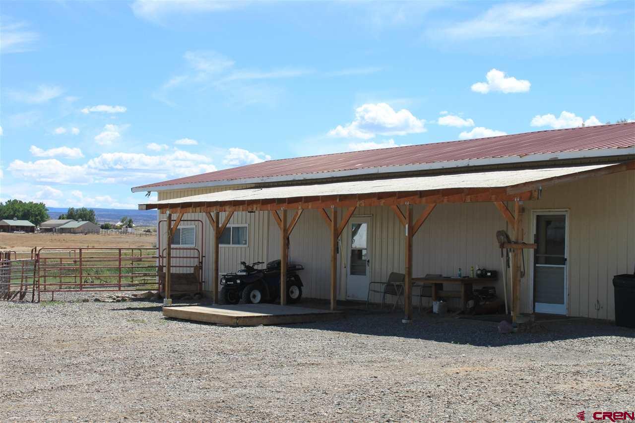 13580 25 Mesa Road Delta, CO 81416 - Photo 3 of 33 a view of a porch
