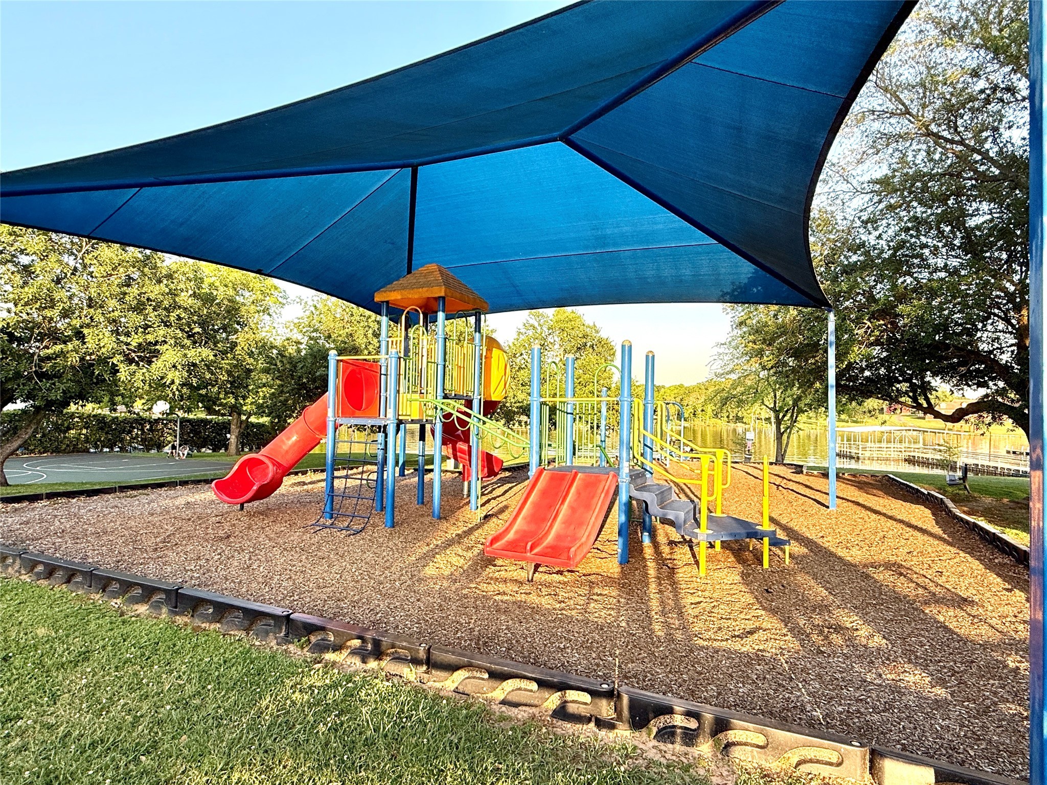 7041 Kingston Cove Lane, Unit 241 Willis, TX 77318 - Photo 15 of 17 a view of park with slide