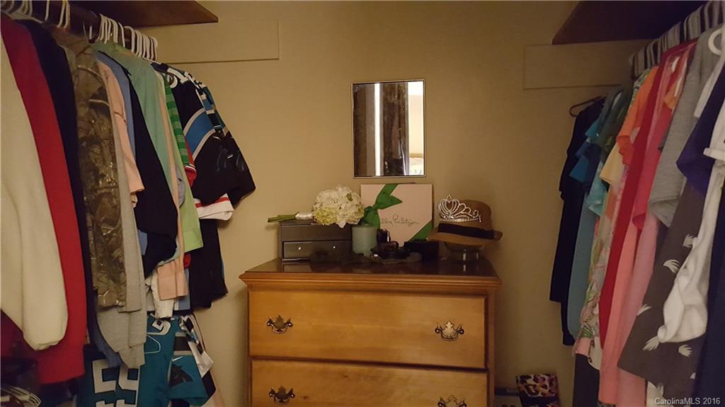 1130 Foxberry Road Lincolnton, NC 28092 - Photo 14 of 22 a view of walk in closet with clothes