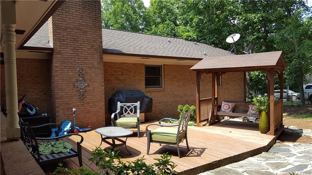 1130 Foxberry Road Lincolnton, NC 28092 - Photo 19 of 22 a backyard of a house with outdoor seating