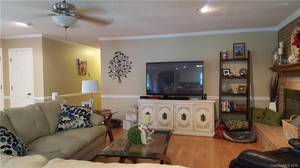 1130 Foxberry Road Lincolnton, NC 28092 - Photo 4 of 22 a living room with furniture and a flat screen tv