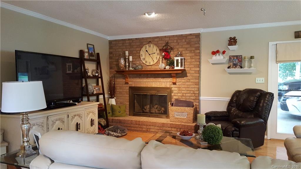 1130 Foxberry Road Lincolnton, NC 28092 - Photo 5 of 22 a living room with furniture and a fireplace