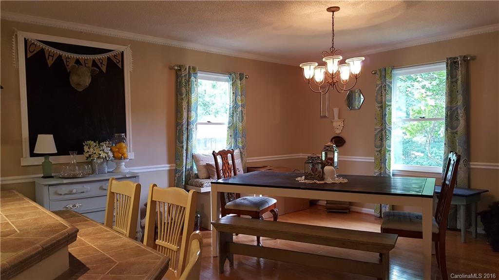 1130 Foxberry Road Lincolnton, NC 28092 - Photo 9 of 22 a view of a dining room with furniture window and outside view