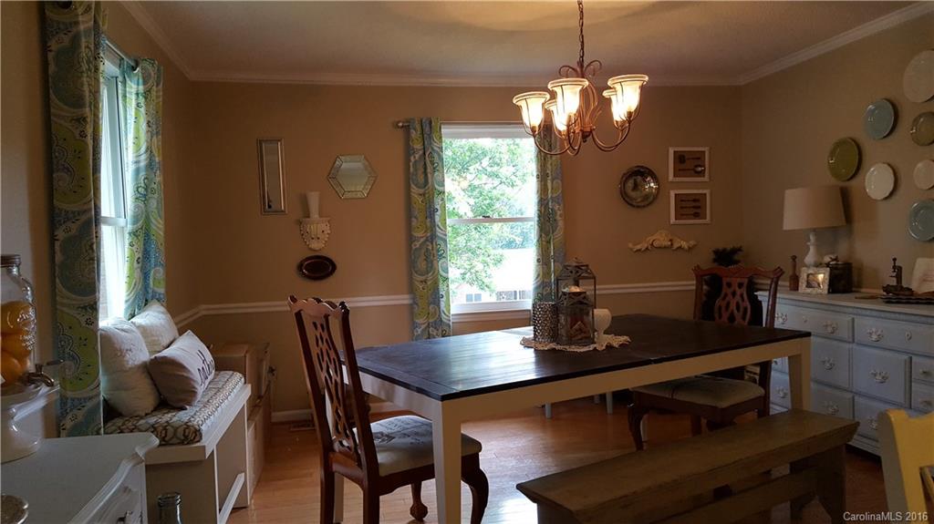 1130 Foxberry Road Lincolnton, NC 28092 - Photo 10 of 22 a view of a dining room with furniture and chandelier