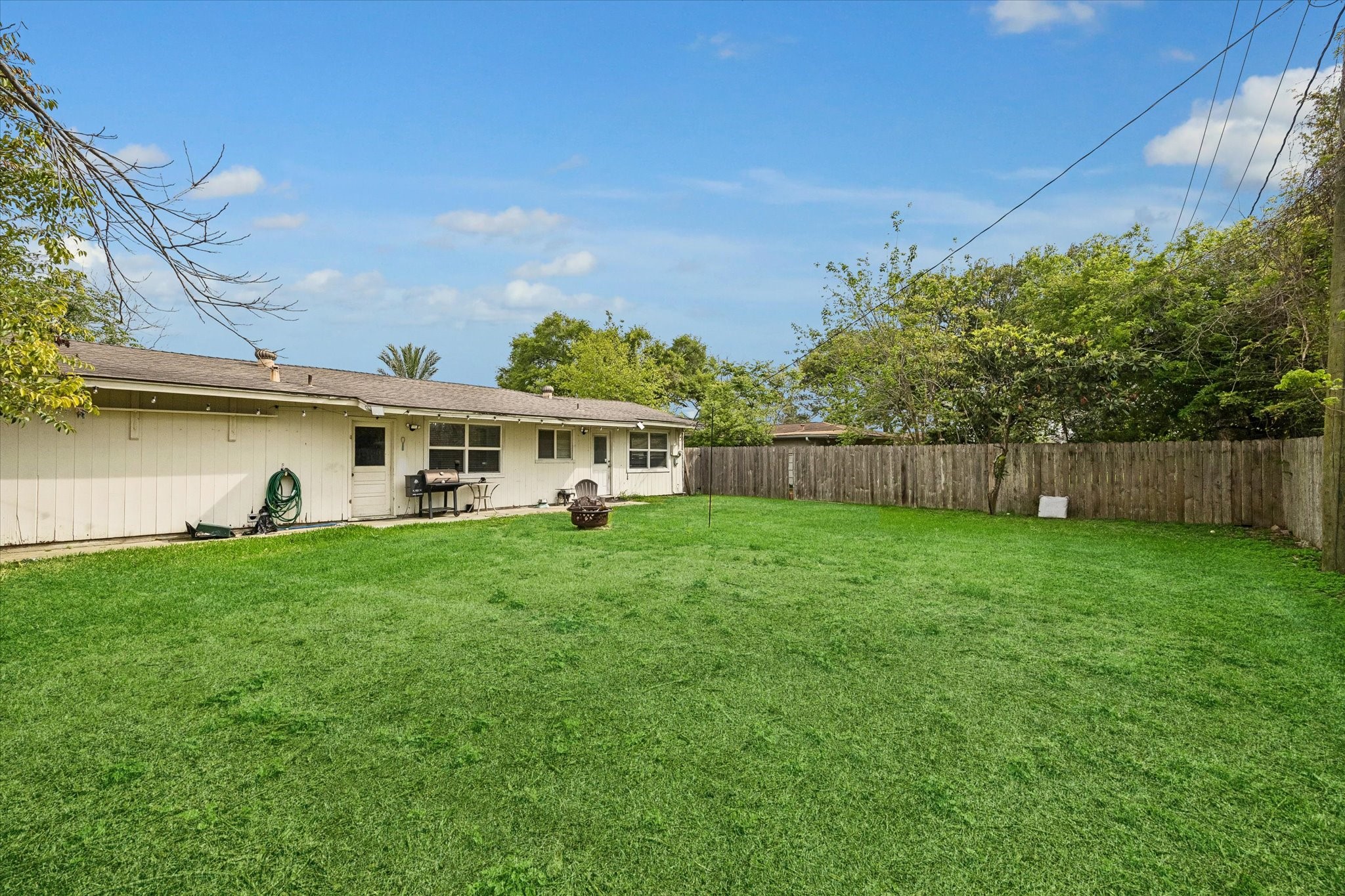 6821 Leader Street Houston, TX 77074 - Photo 14 of 14 a view of a house with backyard