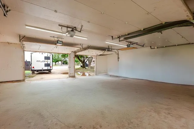 a view of swimming pool with outdoor seating