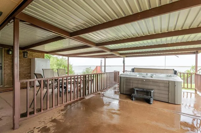a view of a living room and a balcony