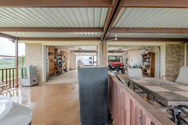 a view of a backyard with sitting area