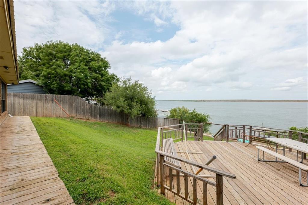 199 Willingham Loop Seymour, TX 76380 - Photo 28 of 40 a view of a backyard with sitting area
