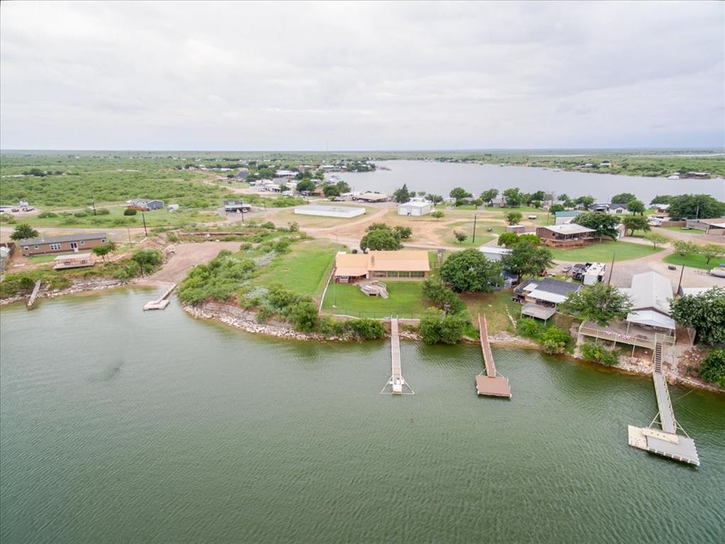 199 Willingham Loop Seymour, TX 76380 - Photo 37 of 40 an aerial view of lake and houses with outdoor space