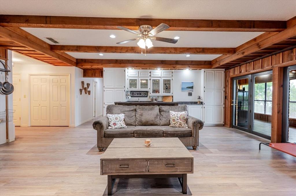199 Willingham Loop Seymour, TX 76380 - Photo 5 of 40 a living room with furniture and wooden floor