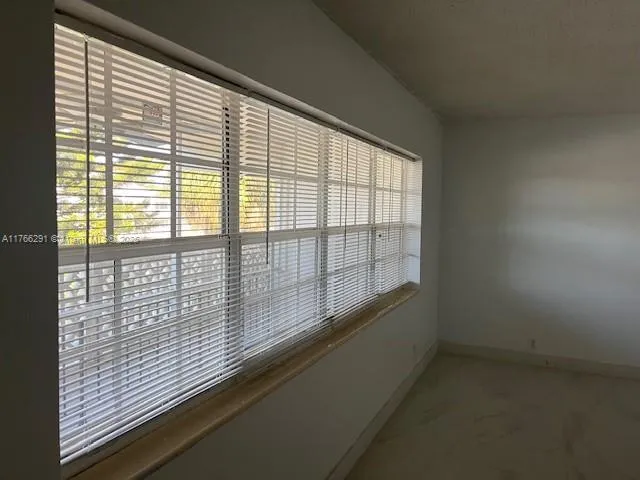 a bathroom with a toilet a sink and bathtub