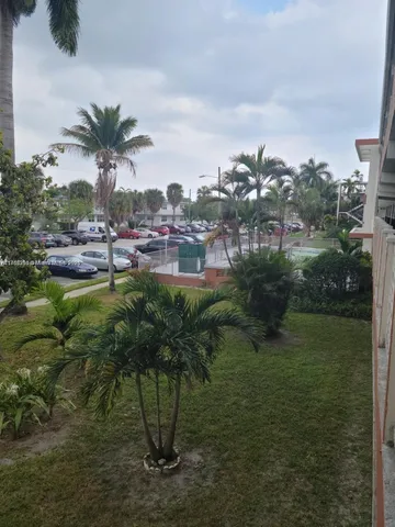 a view of a swimming pool with a terrace