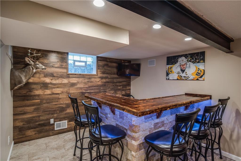4422 Mt Troy Rd Extension Pittsburgh, PA 15214 - Photo 20 of 25 Custom Built Bar made with 100 Yr old Barn Wood & Airstone