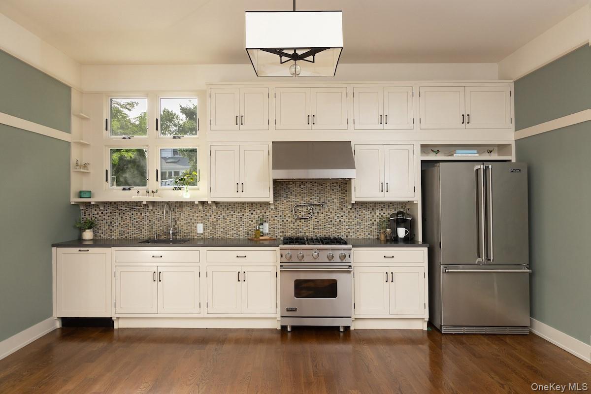 10 Sherman Avenue Dobbs Ferry, NY 10522 - Photo 11 of 36 a kitchen with granite countertop white cabinets and a stainless steel appliances