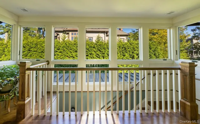 a view of a porch with wooden floor and outdoor space