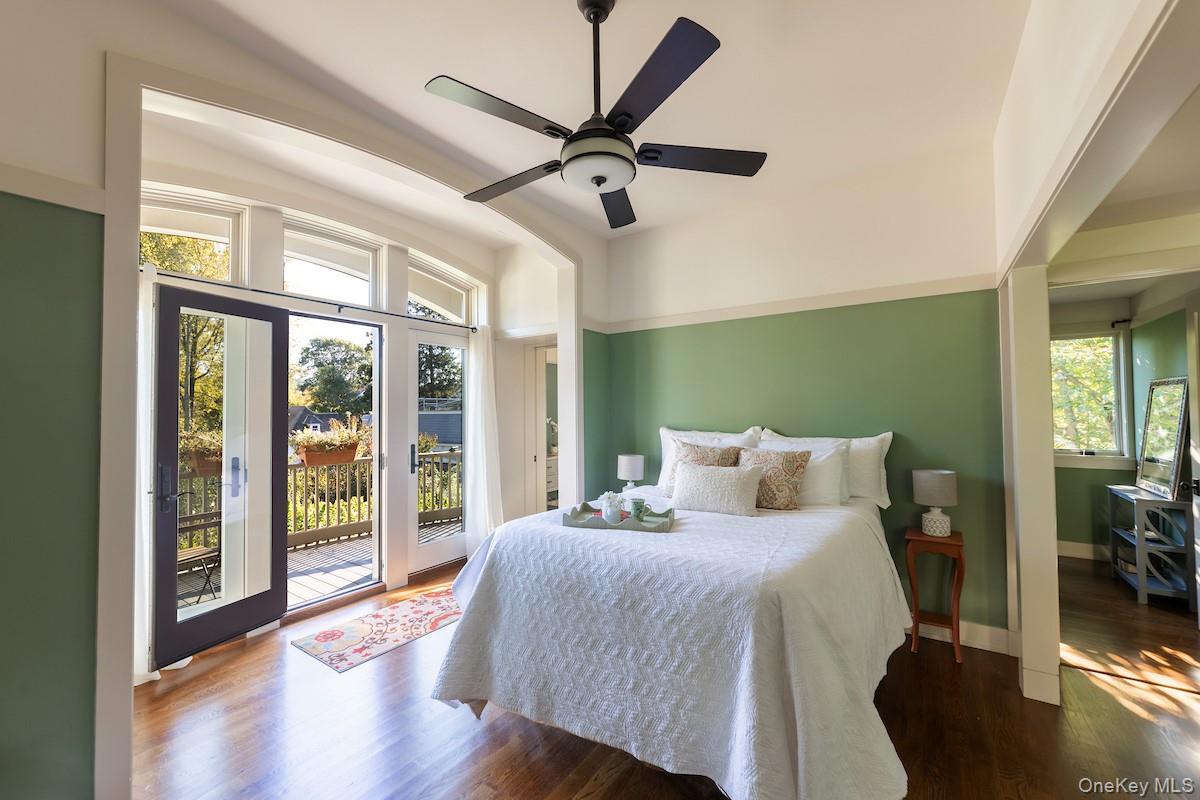 10 Sherman Avenue Dobbs Ferry, NY 10522 - Photo 17 of 36 a bedroom with a large bed and a large window