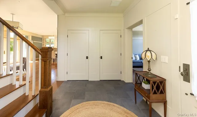 a view of front door with wooden floor