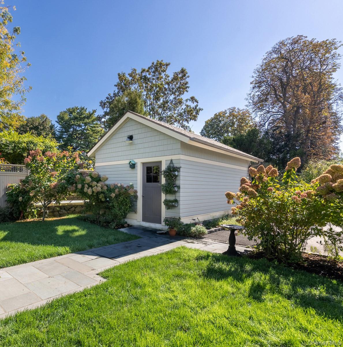 10 Sherman Avenue Dobbs Ferry, NY 10522 - Photo 32 of 36 a view of backyard with garden and plants