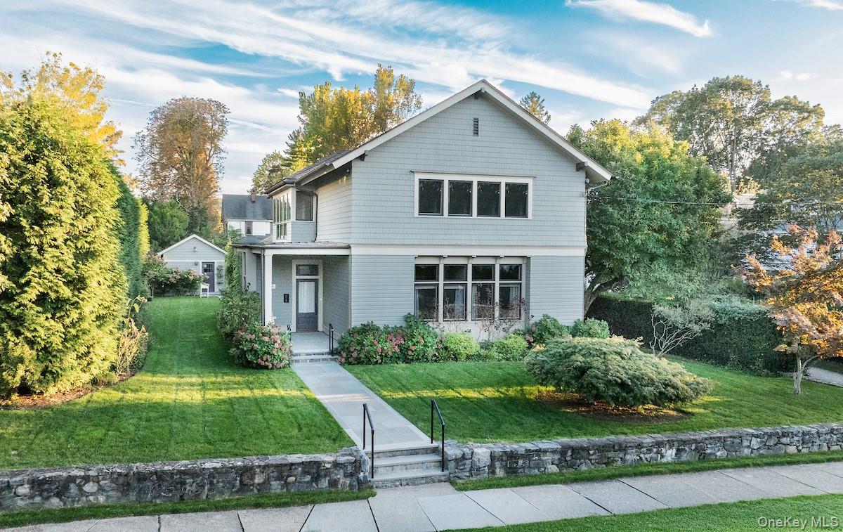 10 Sherman Avenue Dobbs Ferry, NY 10522 - Photo 35 of 36 a front view of a house with a yard