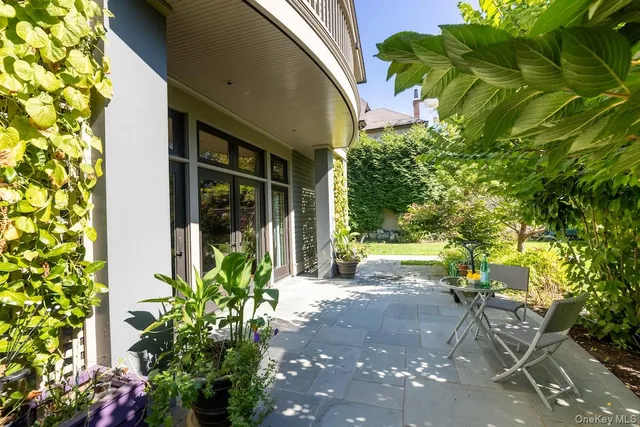 a house with a potted plant in front of it