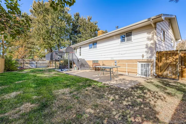 a living room with furniture or couch and a table