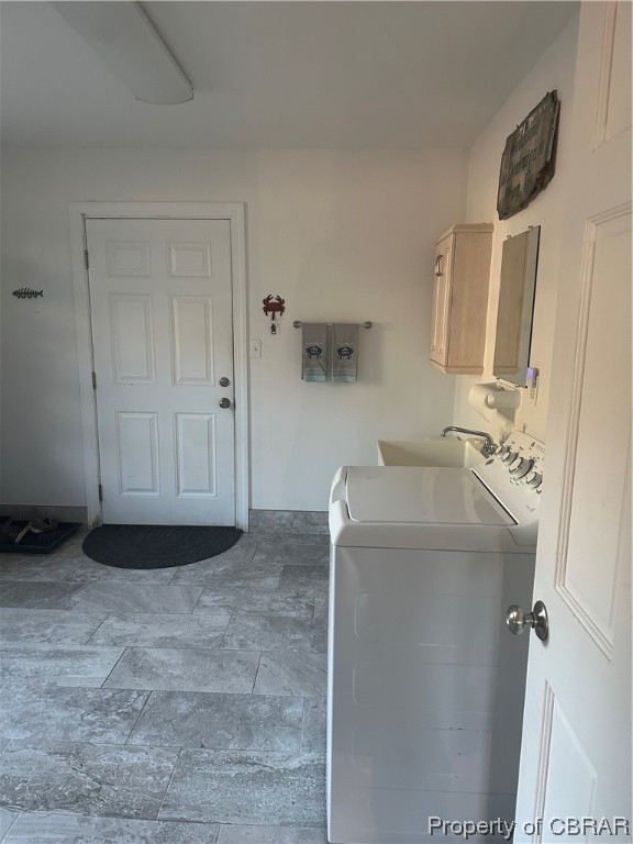 838 Lillys Neck Road Moon, VA 23119 - Photo 15 of 31 Washroom featuring washer / dryer, tile floors, and cabinets