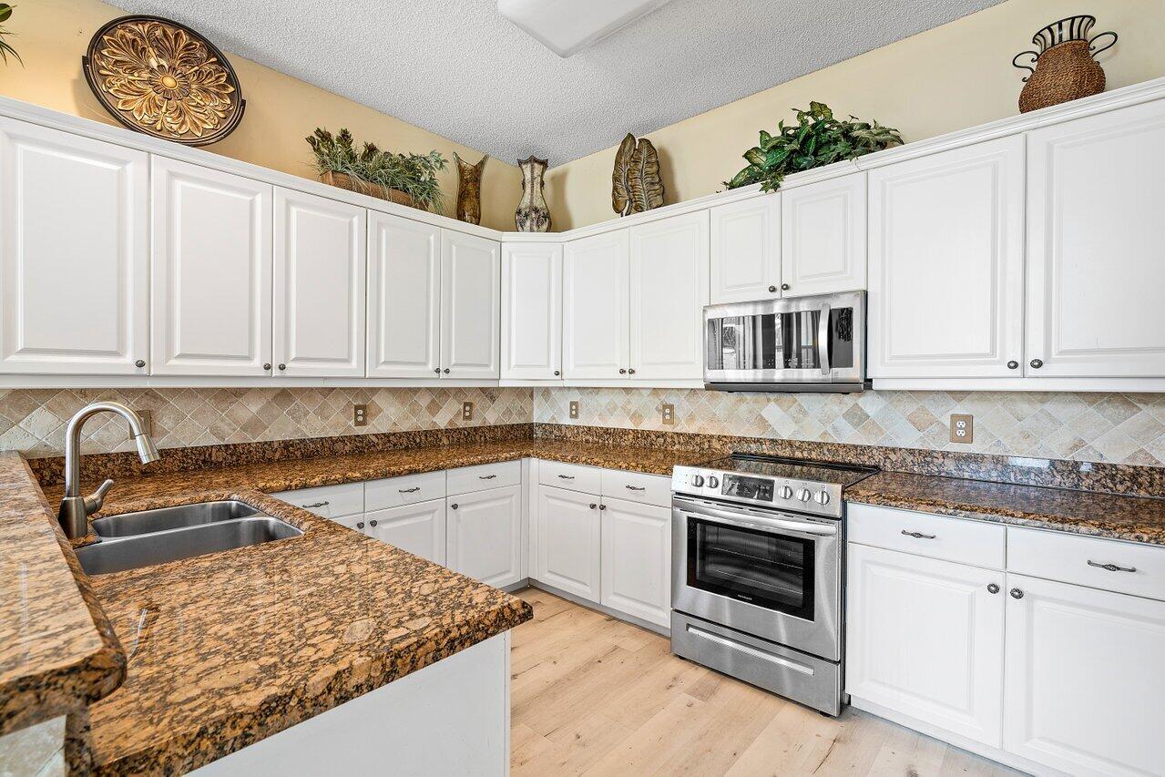 6665 Ashburn Road Lake Worth, FL 33467 - Photo 17 of 50 017-6665AshburnRoad-LakeWorth-FL-33467-S