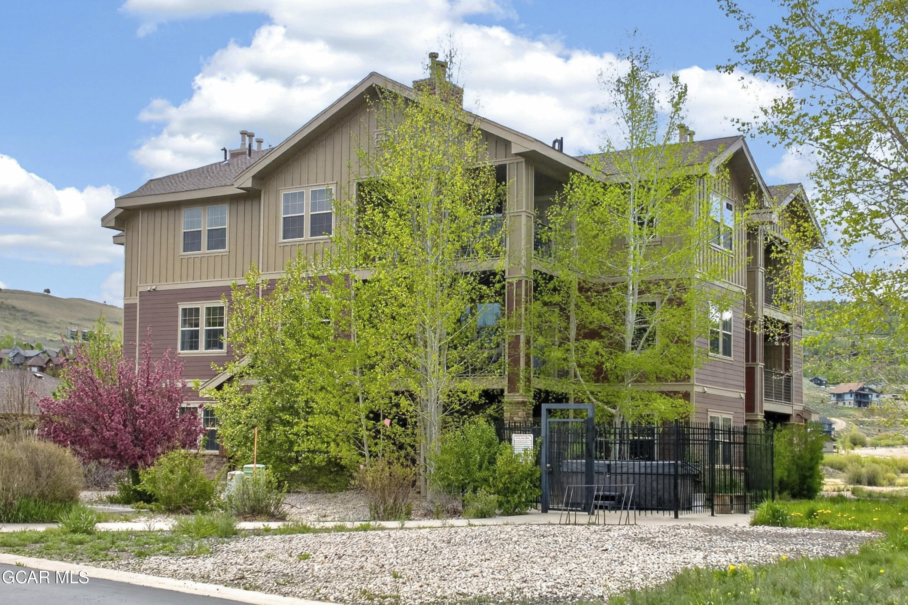 158 Village Road Granby, CO 80446 - Photo 24 of 46 a front view of a house with a yard