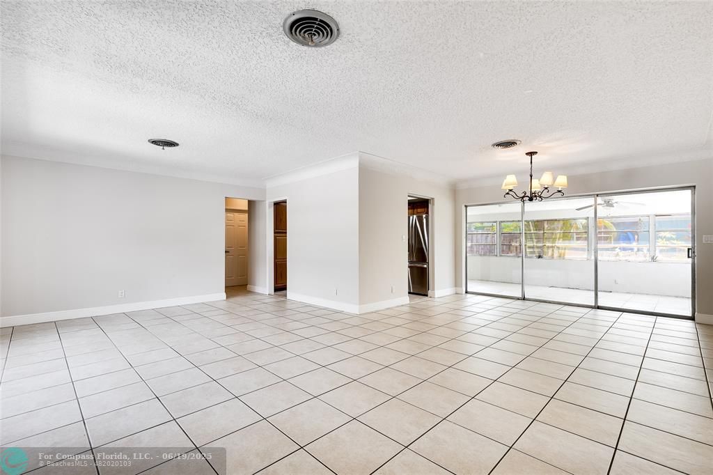 3460 Northeast 28th Avenue Lighthouse Point, FL 33064 - Photo 2 of 37 a view of an empty room and window