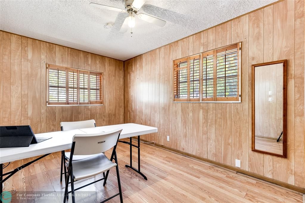 3460 Northeast 28th Avenue Lighthouse Point, FL 33064 - Photo 22 of 37 a view of a dining room with furniture window and wooden floor