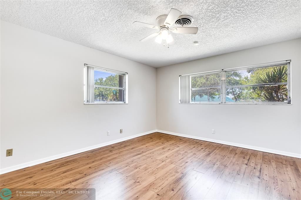 3460 Northeast 28th Avenue Lighthouse Point, FL 33064 - Photo 28 of 37 a view of empty room with wooden floor