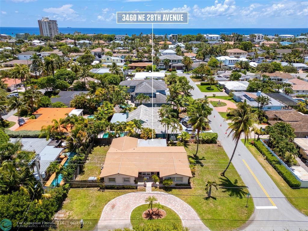 3460 Northeast 28th Avenue Lighthouse Point, FL 33064 - Photo 33 of 37 a view of a swimming pool