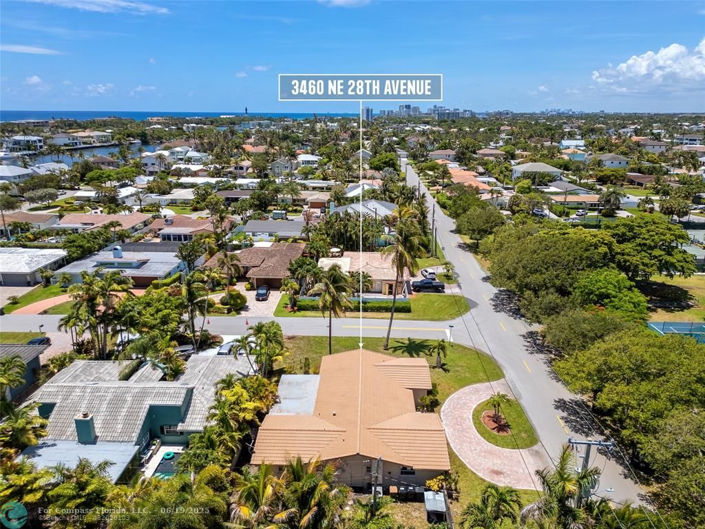 3460 Northeast 28th Avenue Lighthouse Point, FL 33064 - Photo 36 of 37 an aerial view of residential houses with outdoor space